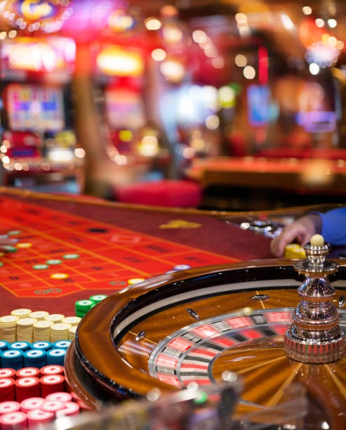 Live casino dealer and gaming table setup